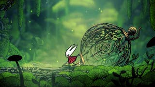 Hollow Knight Silksong screenshot showing close up of red and white Hornet character in lush green environment next to metallic orb