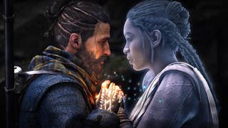 A side-on screenshot of a bearded and ponytailed man and a ghostly, braided-haired woman, pulled tight, holding hands, and looking at each other lovingly. Magic glows where their hands touch.