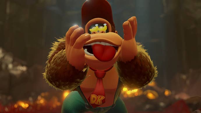 Donkey Kong with a goofy and excited expression, and banana symbols appearing in DK's eyes in the Switch 2 game Donkey Kong Bananza.