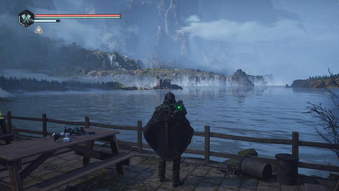 Hell is Us screenshot showing protagonist standing in front of a beautiful lake