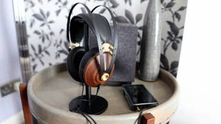 Meze 99 Classic headphones on a stand