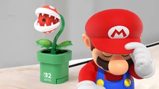 Mario is seen looking sad and lowering his head in front of the piranha plant camera for Switch 2.