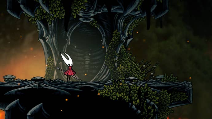 Hornet stands beside the altar in Deep Docks where Swiftstep is acquired in Hollow Knight: Silksong