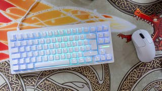 Wooting 80HE mechanical keyboard with RGB shown on a gaming mouse pad