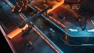 A Light Cycle zips through a neon street in TRON: Catalyst.