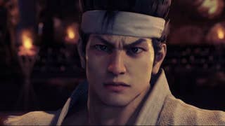 Virtua Fighter 5 REVO trailer screenshot showing Akira close up wearing white bandana